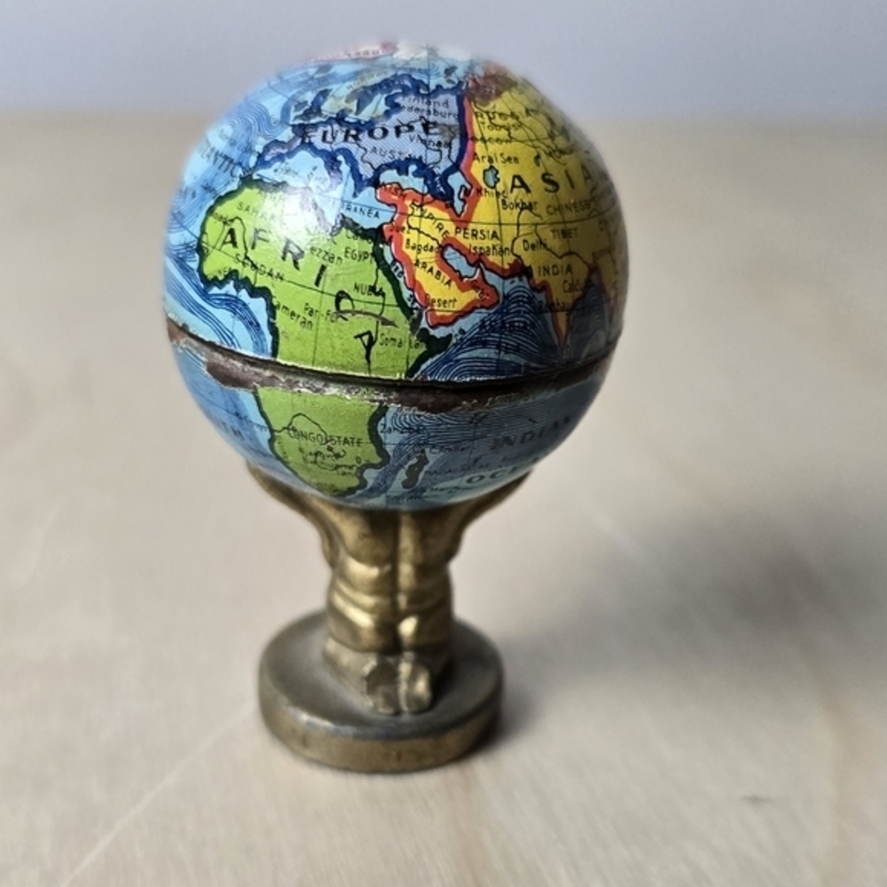 1920s Antique Atlas Holding Earth Pencil Sharpener Made In Germany Trade Routes